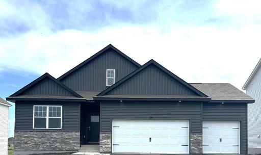 Welcome home to our Dover II Floorplan! Single level living has the perfect balance of open concept with defined spaces for your kitchen, dining and living room needs. Actual photo of home.