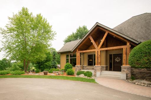 Grand front entry with paver-stone walkway