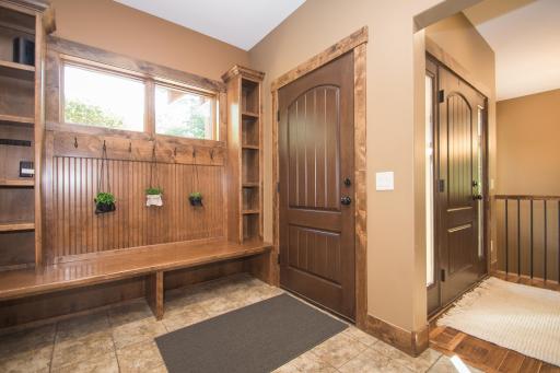 Locker-style built-in storage with bench and hooks