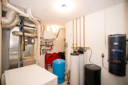 Dual heating (electric and propane), central vacuum, air exchanger, passive radon mitigation system