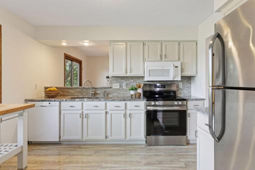 Updated Kitchen with granite counter tops.