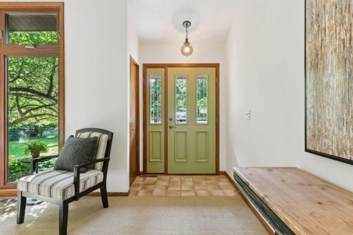 Welcoming entry with coat closet