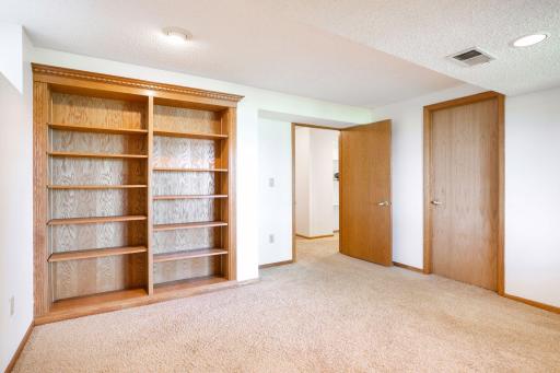 Lower Level Bedroom that doubles as office, workout room or den!