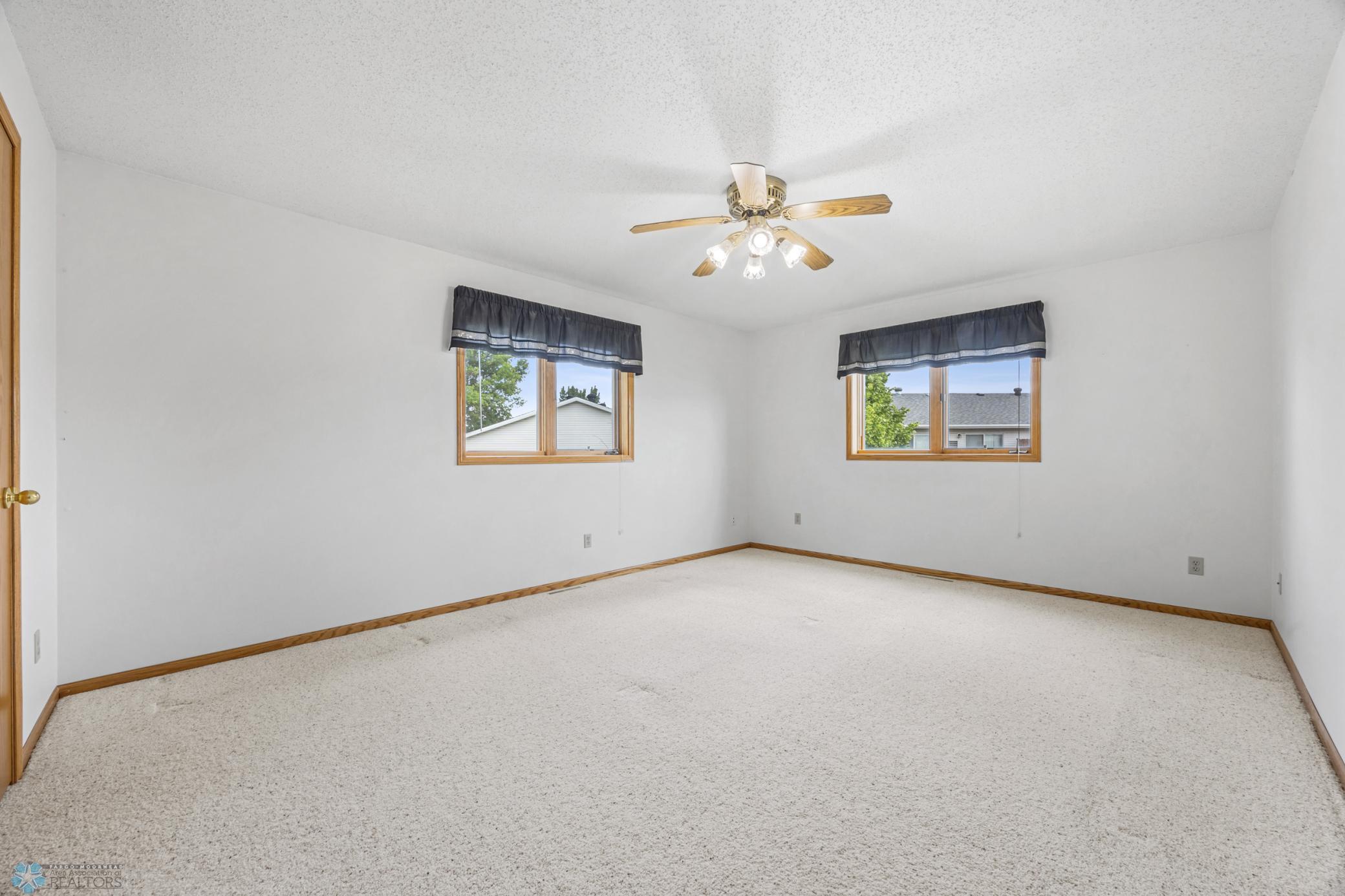 HUGE Primary bedroom! Walk-in closet too.