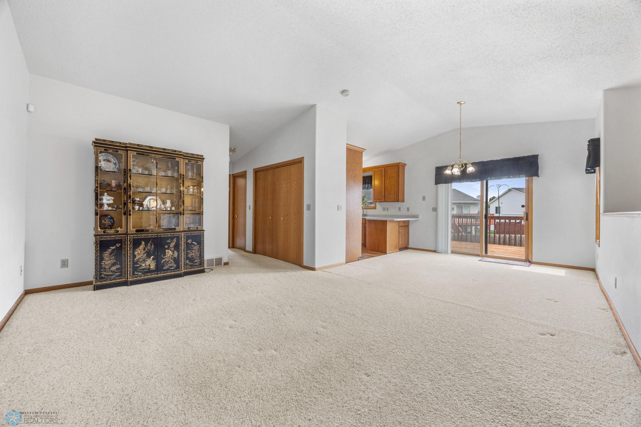 Spacious with tons of storage. Living and Dining rooms, with patio door to the deck. Vaulted ceilings too!