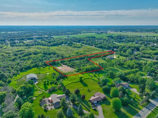 This scenic 4.15-acre lot is prepped and ready to bring your vision to life! Enjoy peaceful country living with the convenience of being close to town, sloped terrain with walkout potential, and the freedom to choose your own builder.