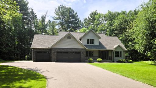 4 Bedroom, 2.5 Bathroom Home Nestled on a 1.02 Acre Wooded Lot! Covered Front Porch!