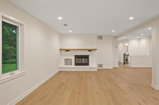 1 of 2 wood burning fireplaces and checkout these stunning engineered hardwood floors!