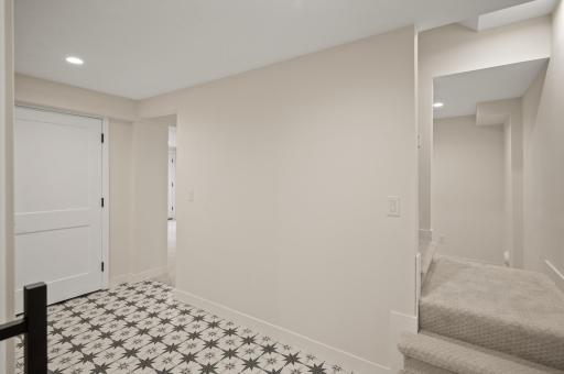 split stairs allow access to upstairs from garage and laundry without walking around to family room