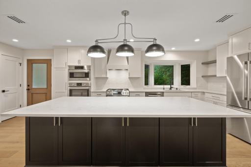 A chef's dream kitchen with a 120" Island!!