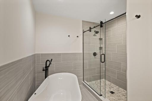 Huge double shower and soaking tub to wash away the stresses of the day