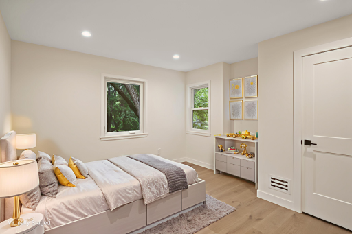 Huge secondary bedroom on main level. *virtually staged