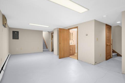 Clean and bright lower level with storage and 3/4 bath.