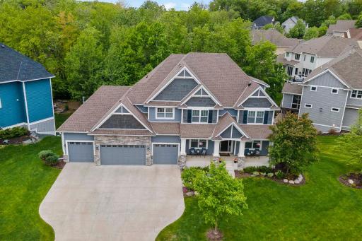 This custom Gonyea home is unlike any other! Full concrete driveway and concrete front porch, Hardie siding, and a decked out 4 stall heated garage.