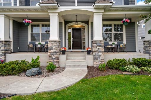 Enjoy outdoor living on the expansive full concrete patio, perfect for entertaining or relaxing. The professionally landscaped, fully fenced yard offers both privacy and pristine curb appeal, creating a serene retreat right at home