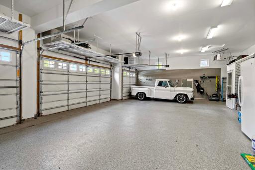 A dedicated staircase leads directly from the garage to the basement, providing a convenient private entry ideal for guests, in-laws, or a home business setup.