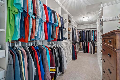Closet number one is sure to impress, boasting top-of-the-line, all custom built-ins designed for maximum organization and luxury.
