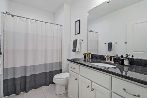 The private theater bathroom adds convenience and comfort, offering easy access without leaving the entertainment spaceâperfect for uninterrupted movie nights and gatherings.