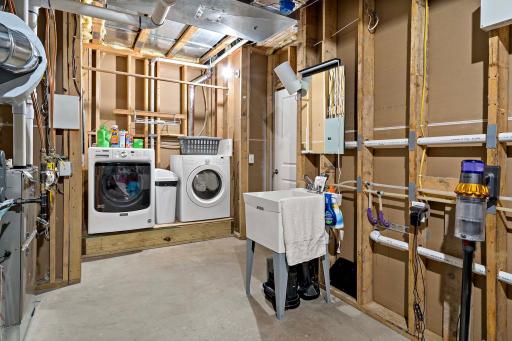 Second laundry space located in the lower level.