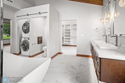 Primary bath laundry area