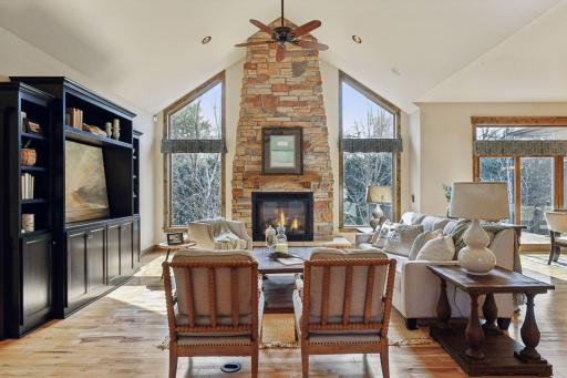 The main level boasts impressive 10-foot ceilings, with the great room featuring a vaulted ceiling that soars to nearly 16 feet, enhancing the sense of spaciousness and grandeur.