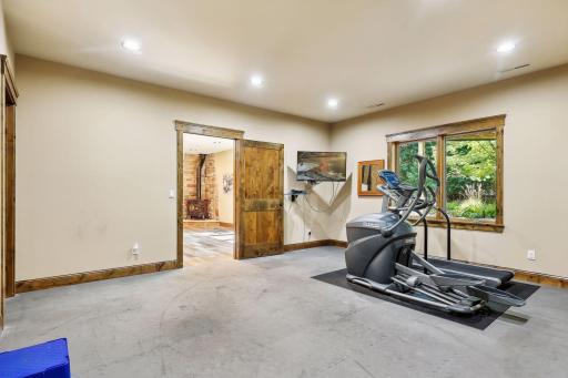 The fitness room offers ample space for several pieces of equipment and can easily be converted into another bedroom or any other desired use.
