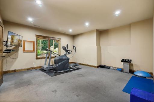 This versatile area of the home can serve many purposes, including a fitness space, home theater, crafting or gaming room.