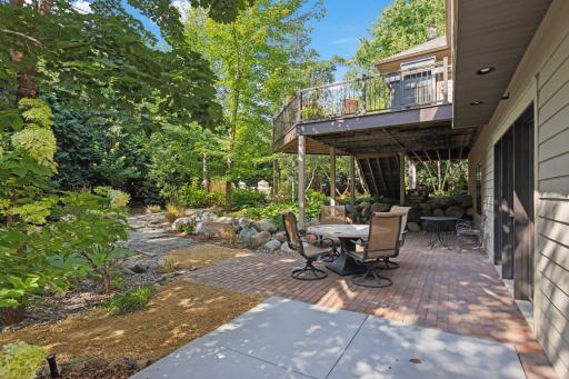 The generous size of the patio and deck allows for versatile outdoor living. Whether itâs hosting gatherings, enjoying morning coffee, or simply soaking up the sun, thereâs plenty of room to relax and entertain. There is a pad and wiring for a hottub