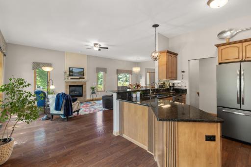 Granite countertops and stainless steel appliances.