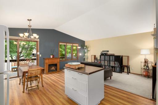 Vaulted ceilings give this area a true wow factor. The kitchen island gives additional storage and counter top space.