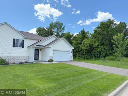 Discover comfort, space, and modern style in this newer duplex overlooking wooded city park including a disc golf course.