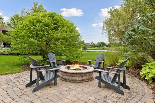 Picturesque deck and patio overlooking water