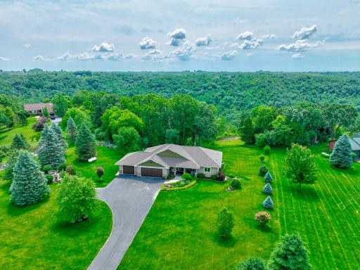 Welcome to W10654 566th Ave, your custom built dream home awaits!