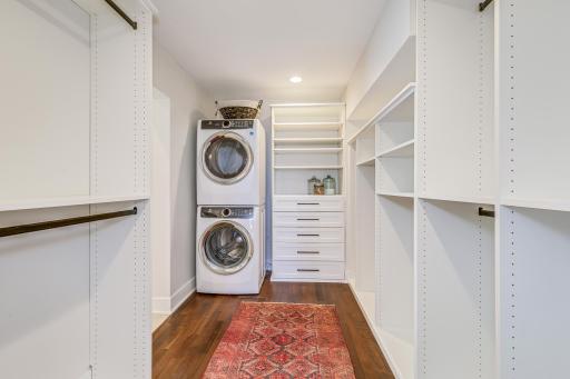 Primary bedroom walk-in closet - complete with main level laundry.