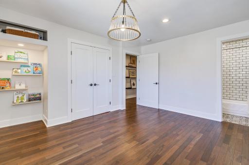 Main level secondary guest space. This room features an open library nook and full bath - your child or guests have never had it so good. 3 bedrooms on one level - the main level.