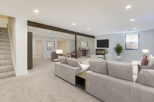 Newly completed Lower Level family room - activity center. Virtually staged.