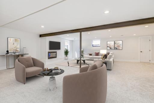 Additional view of lower-level family room. Virtually staged.