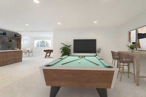 Amusement / Activity room, lower-level. Virtually staged.