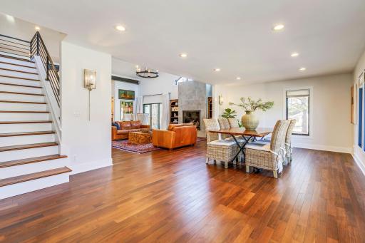 New, dramatic, Brazilian walnut, hardwood floors continue throughout the main and upper level of this fine home. Imagine the personal design one can achieve by placing unique and personal floor coverings, adding personality and individualized color