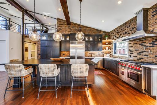 Amazing is an understatement. You will love the oversized Island with the highest level of Cambria and the perimeter of the kitchen has exceptional, high-end quartz.