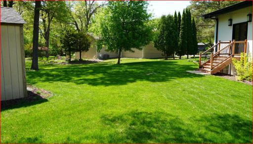 Large lot featuring mature trees, meticulously maintained, lush, landscaping, and a beautiful stamped concrete patio - are but a few features of this desired, .49 acre lot.