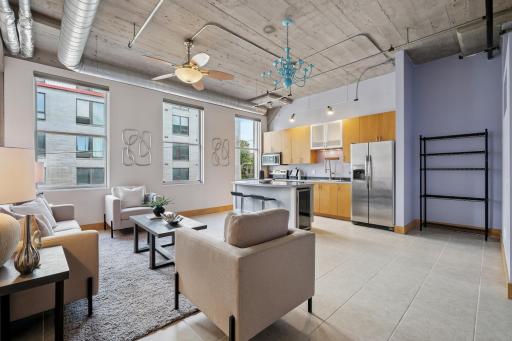 Open layout with Tall Windows including motorized blinds!