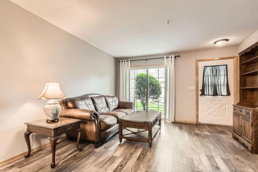 Welcome home to you bright and welcoming living room.
