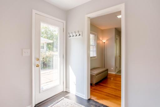 Convenient and bright side-door access offering a seemless indoor-outdoor lifestyle.