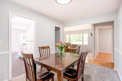 Well-connected dining space with direct sightlines to the kitchen and living room, ideal for hosting.