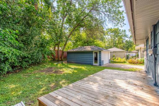 Spacious wood deck provides the perfect spot for grilling, lounging, or entertaining.