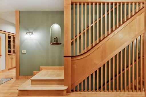 The wood details & craftsmanship, showcased on the stairway leading you upstairs.