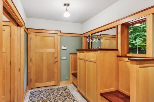 Garage entrance - benches & lockers making getting out the door a breeze!