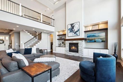 Large vaulted ceilings with gas burning fireplace awaits you with stunning views of the lake!