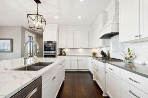 Beautiful kitchen with high end appliances, on and yes, there is a pantry as well!